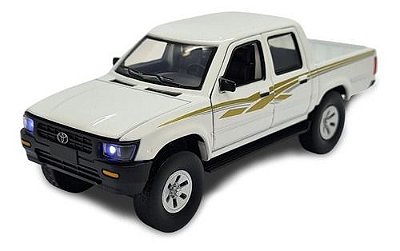 Miniatura Toyota Hilux 1999 Branco Metal Acende Luz/som 1:32