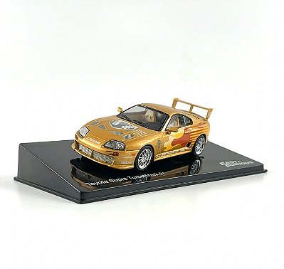 Miniatura Velozes e Furiosos Toyota Supra Dourado 1:43