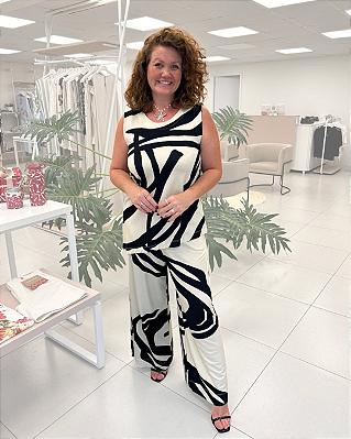 CALÇA PANTALONA EM MALHA ESTAMPA ABSTRATA