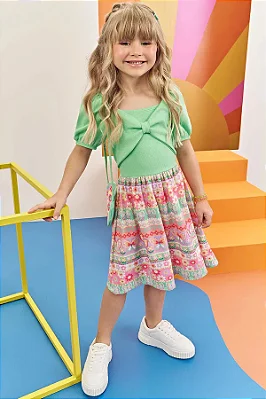 Vestido em Canelado Trançado e Malha Power. Acompanha Bolsa Infanti