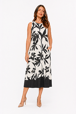 Vestido linha resort em viscose estampa floral com bolso lateral sem manga