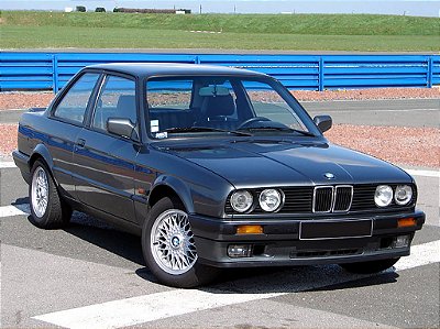 BMW 325i 1987 1:18 Solido Cinza