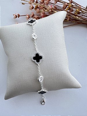 Pulseira de trevos ônix cravejada e pontos de luz