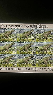 Mini Folha de Selos do Tadjiquistão - Temática Dinossauros - ref.943