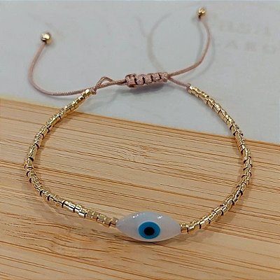 Pulseira canutilhos banhado a ouro com olho de madrepérola