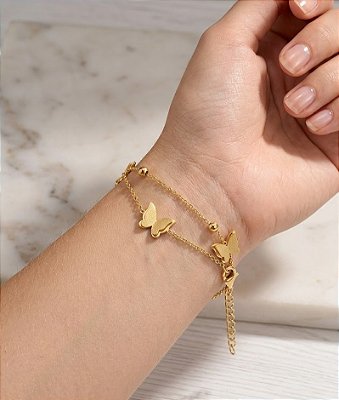 PULSEIRA DUPLA CORRENTE ESFERA E PINGENTE BORBOLETA JATEADA AÇO DOURADO 316L⭐️