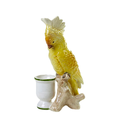 Cacatua amarela no tronco com vasinho