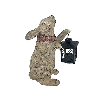 Coelho em resina com lanterna
