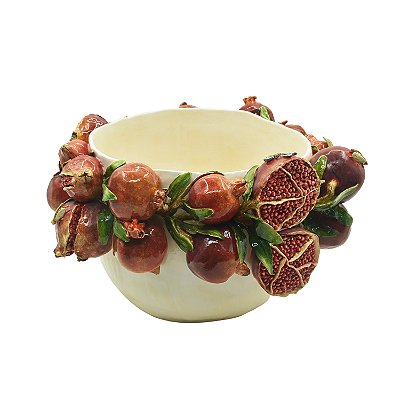 Cachepot amassado com romãs na borda