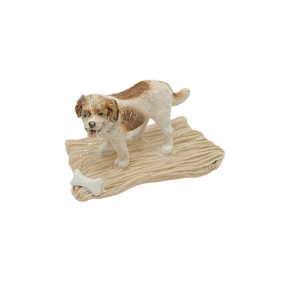 Enfeite cachorro no tronco com osso