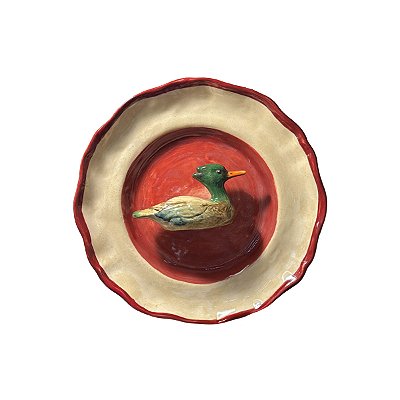 Prato de parede vermelho com aplique de pato