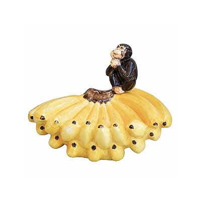 Cacho de bananas com macaco de faiança