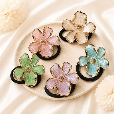 XUXINHA COM APLICAÇÃO DE FLOR DE METAL