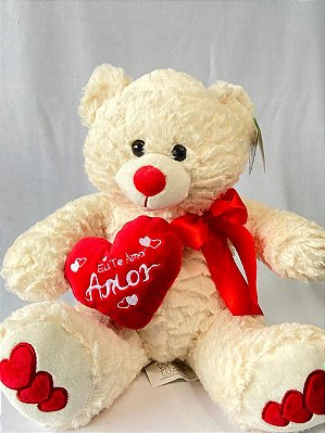 Urso de pelúcia branco com coração