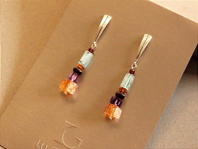 BRINCO IARA LONGO TOPÁZIO IMPERIAL E PEDRAS VARIADAS