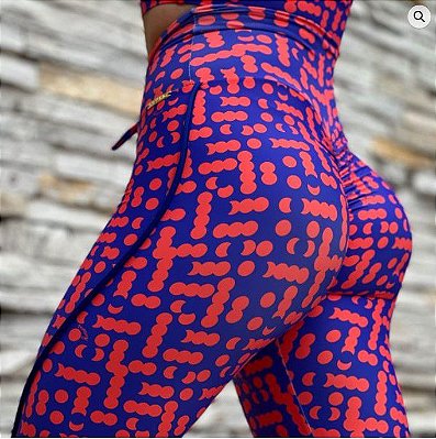 Calça Legging em Jacquard com Fendas e Estampa Animal Print Onça Laranja