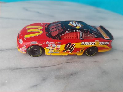 Miniatura de metal Hot Wheels 1997 Bill Elliot racing car #94 , 8 cm, usado