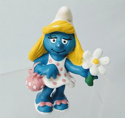 De 1993, Smurfette de vinil Schleich com bolsa e uma flor, 5,5 cm, usada