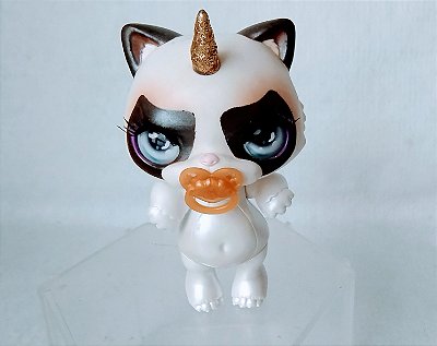 Boneco Poopsie Sparkly Gato rabugento galtando o rabo , 10 cm, marca MGA