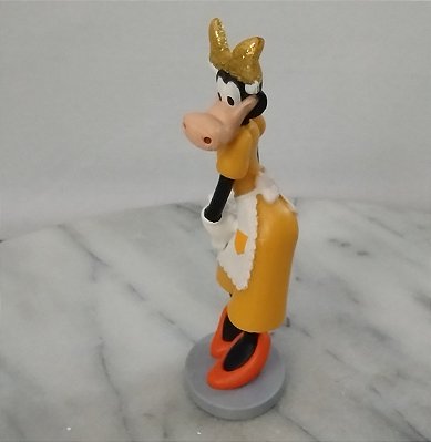 Miniatura Disney Clarabela com fita dourada na cabeça, 10 cm