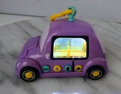 Carrinho de plástico Pixel Chix lilás com luz ,som , fala em português, 9 cm, Mattel 2005
