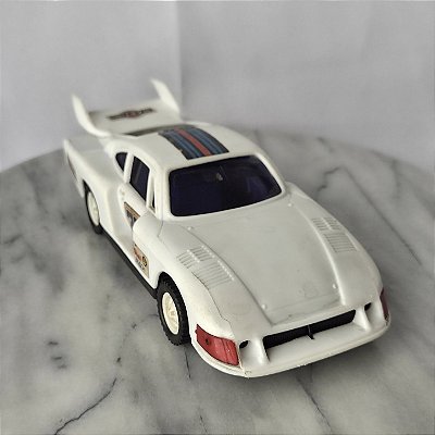 Porsche Branco da Glasslite 1985 com fricção, falta listra no capo e o vidro traseiro tem rachadura, 22 cm
