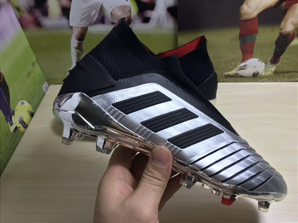 chuteira adidas preta com raios