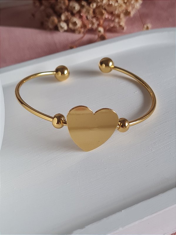 Bracelete dourado com coração em aço inox