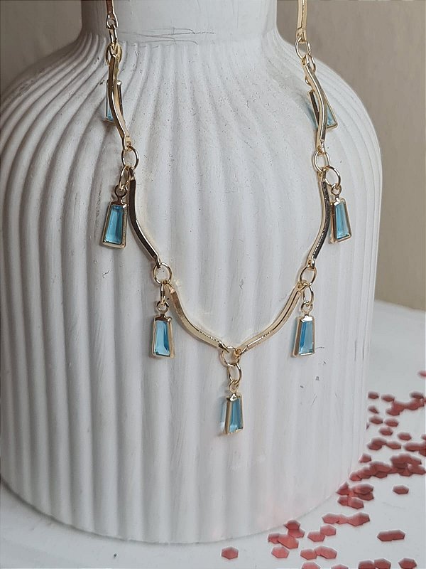 Pulseira com pedrinhas de zircônias azuis banhadas a ouro
