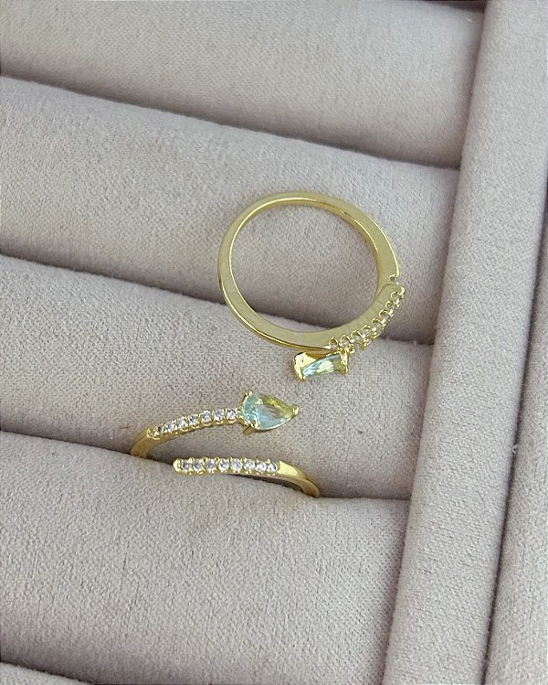 Anel Duas Pontas Cravejadas Azul Claro Regulável - Banho de Ouro 18k