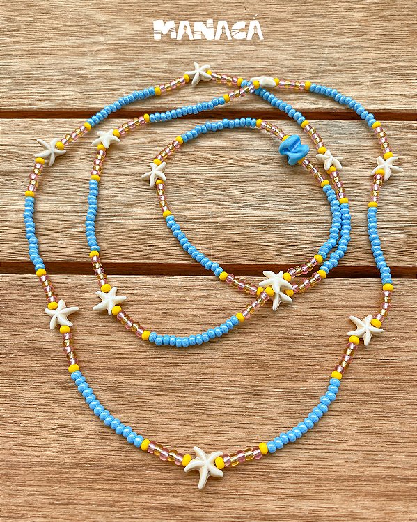 Guia de Erês – Miçangas Jablonex Azul Perolado, Rosa e Dourado com Estrelas do Mar de Howlita e Firma de Murano | Umbanda e Candomblé