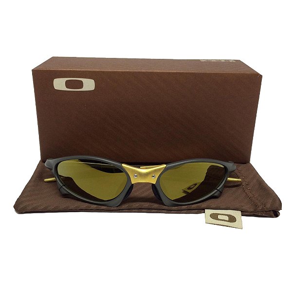 Oculos Oakley  Penny Xmetal lente dourada