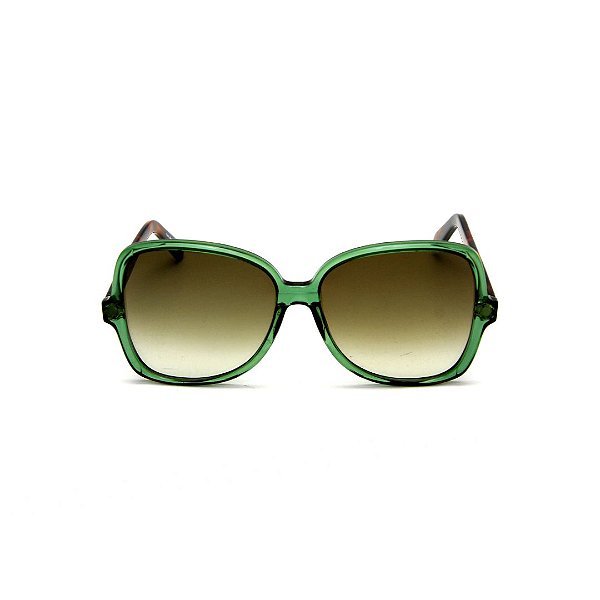 Óculos de Sol Gustavo Eyewear G110 2. Cor: Verde translúcido. Haste animal print. Lentes verde.