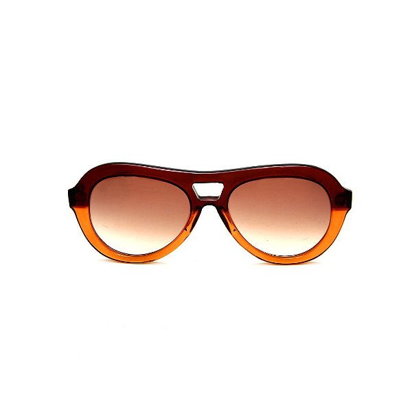 Óculos de Sol Gustavo Eyewear G113 3. Cor: Marrom e âmbar translúcido. Haste animal print. Lentes marrom.
