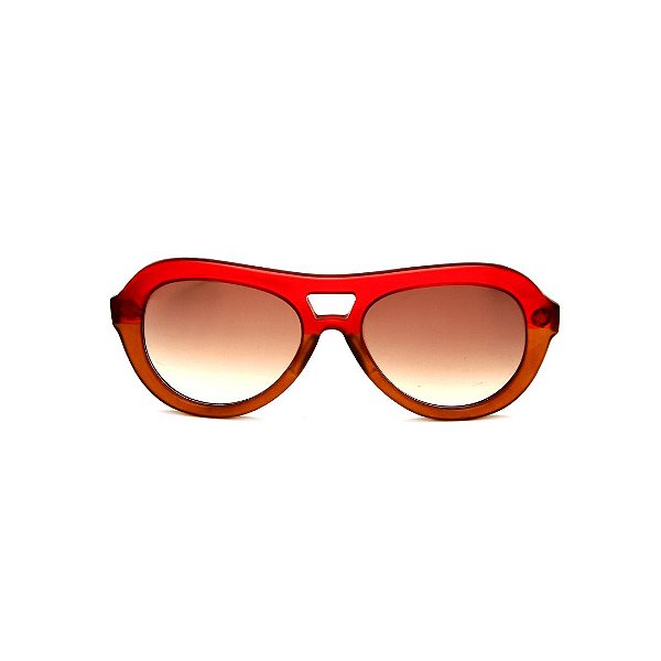 Óculos de Sol Gustavo Eyewear G113 9. Cor: Vermelho e marrom fosco translúcido. Haste animal print. Lentes marrom.