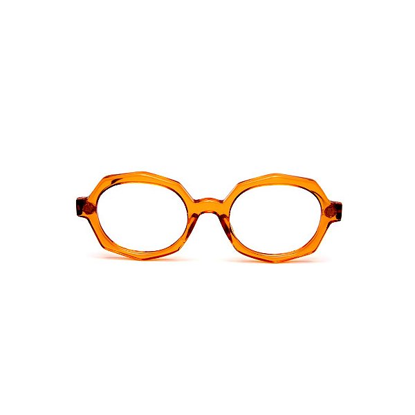 Óculos de Grau G121 3 na cor caramelo translúcido com as hastes animal print.