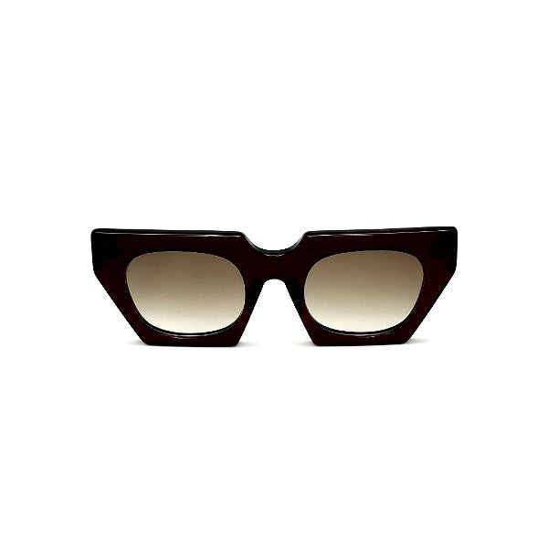 Óculos de Sol Gustavo Eyewear G137 6 na cor preta, hastes Animal Print e lentes cinza.