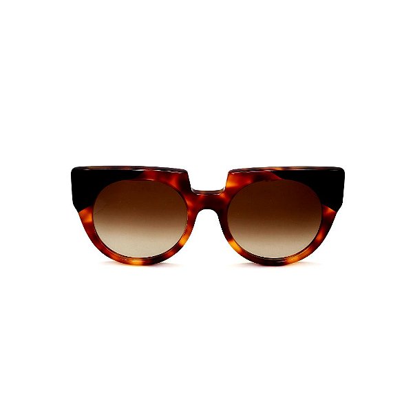 Óculos de Sol Gustavo Eyewear G135 6 em Animal print e preto, hastes animal print. Lentes marrom.