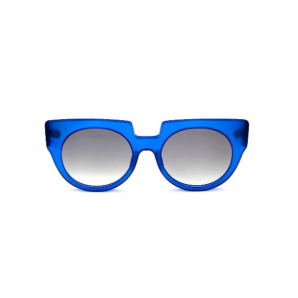 Óculos de Sol Gustavo Eyewear G135 5 na cor azul e hastes animal print. Lentes cinza.