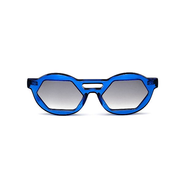 Óculos de Sol Gustavo Eyewear G134 5. Cor: Azul translúcido. Haste animal print. Lentes cinza.