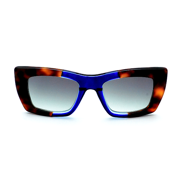 Óculos de Sol Gustavo Eyewear G79 2 em Animal Print e azul. Hastes Animal Print e lentes cinza degrade. Clássico