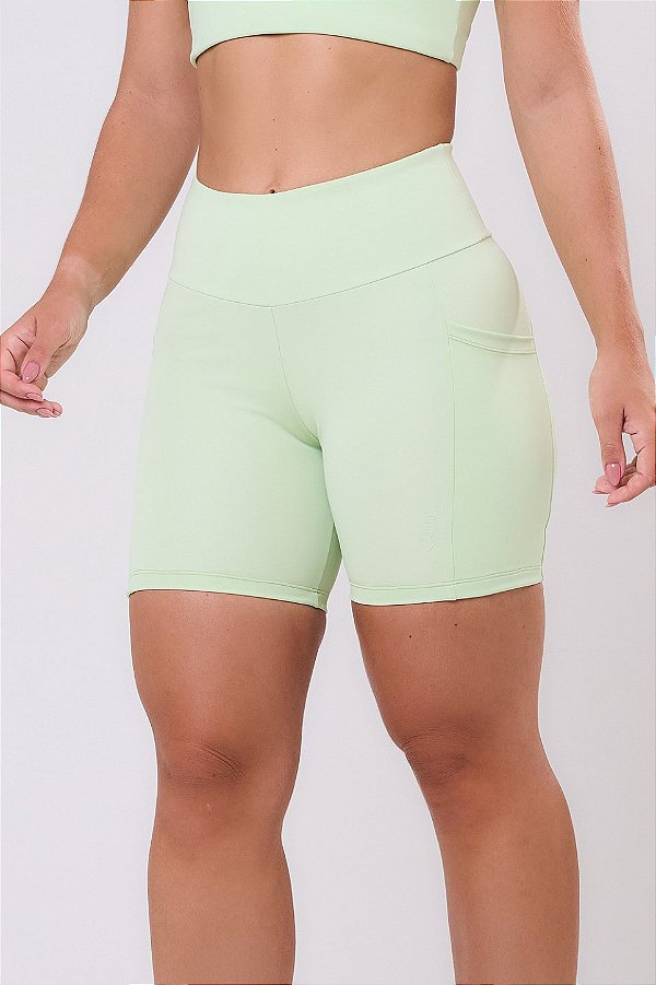 BERMUDA ESSENTIAL RUN STAMINA 3 BOLSOS 15CM VERDE PIXY