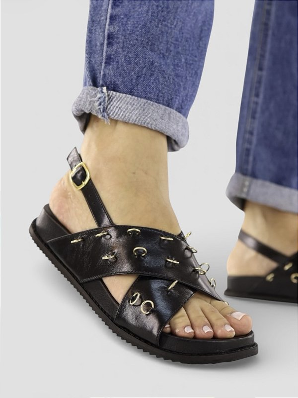 Papete preta ilhós ouro