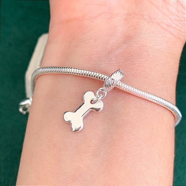 Berloque pet ossinho liso banhado a prata