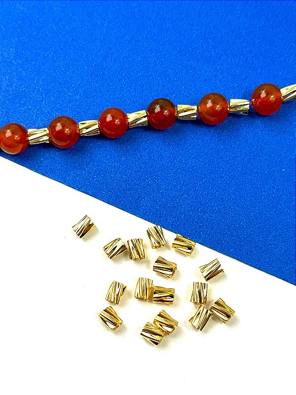 Entremeio Tubo Torcido 5X3Mm Ouro - 50 Pçs