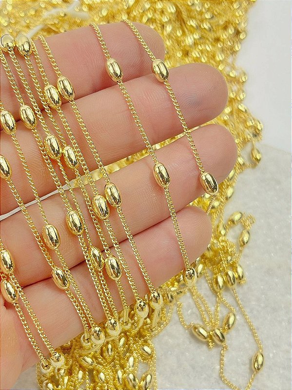 Corrente Grume com arroz elo soldada - banho ouro 2 milésimos e verniz italiano - 1 metro
