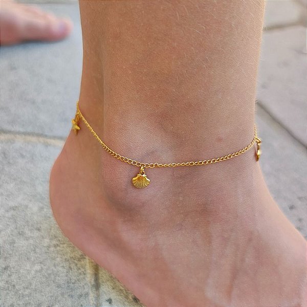 Tornozeleira com estrela e concha Folheado em ouro (LIMITADO)