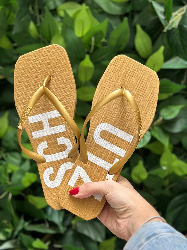 SCHUTZ CHINELO JELLYS SCHUTZ DOURADO