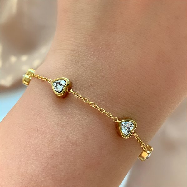 PULSEIRA CORAÇÕES ZIRCÔNIAS DOURADO AÇO 316L⭐️