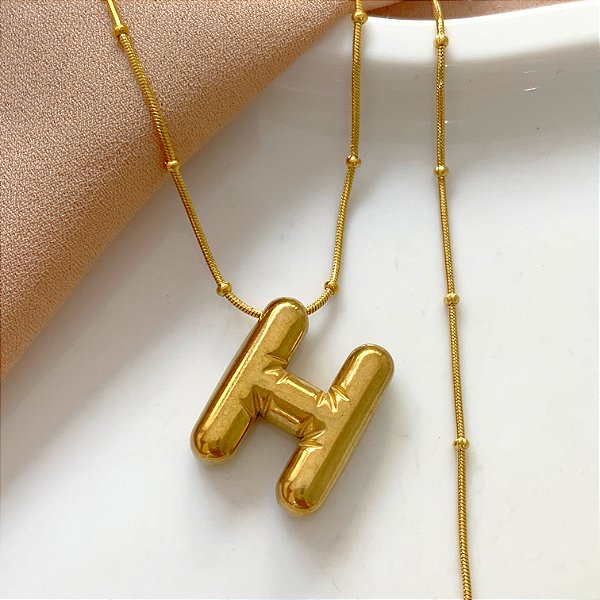 COLAR LETRA BUBBLE E-H DOURADO AÇO 316L⭐️